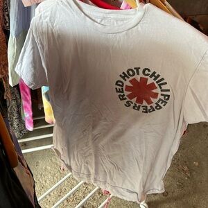 White shirt with the Red Hot Chilli Peppers logo on front and back.